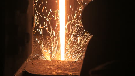 Stream-of-liquid-metal-with-sparks.-Iron-and-steel-production